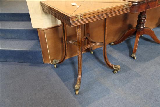 A pair of ebony strung burr walnut envelope card tables, W.1ft 11in. D.1ft 11in. H.2ft 5in.